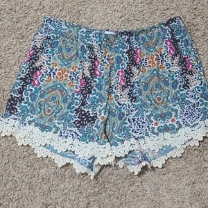 Floral & paisley shorts with cream ruffle trim